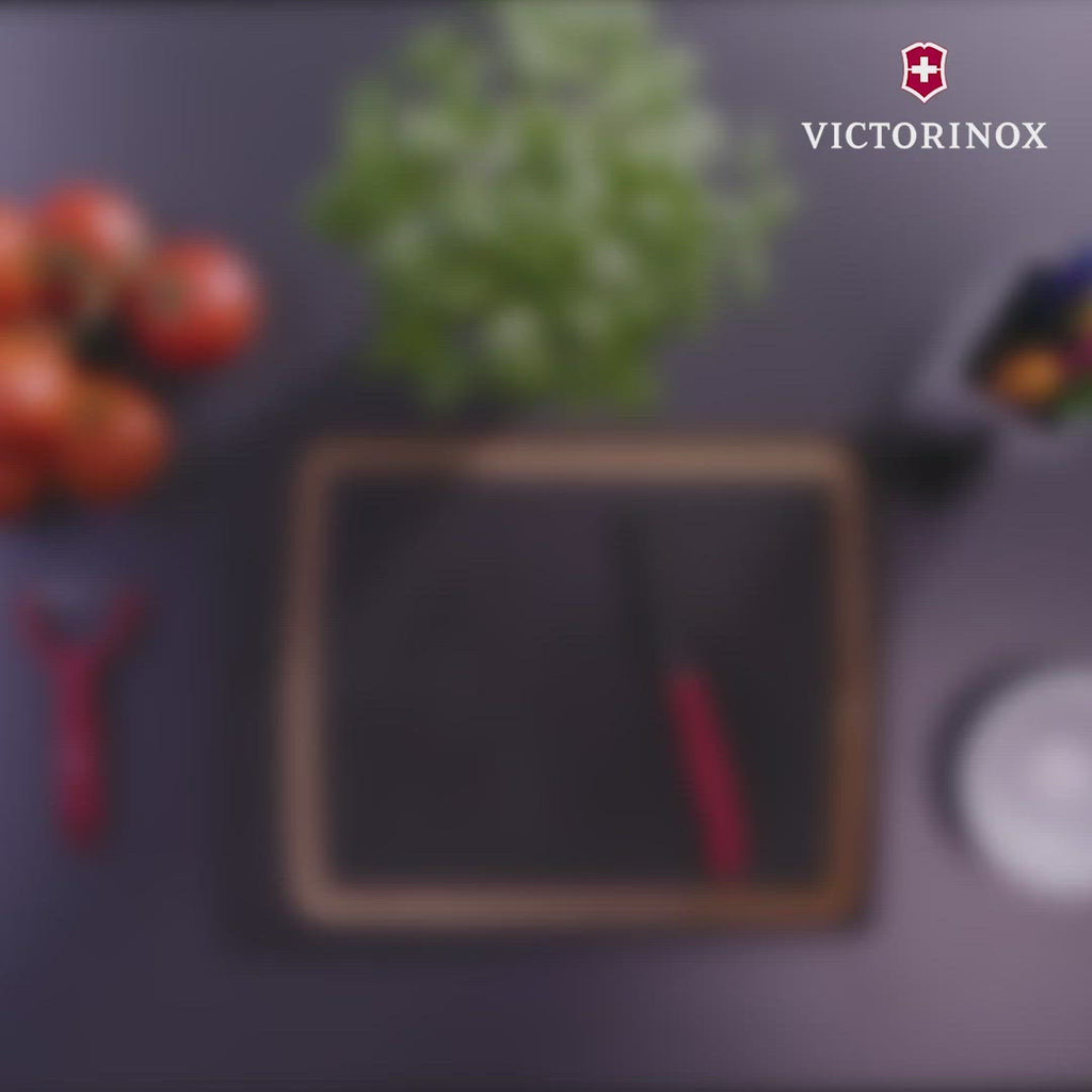 Victorinox SET 2 PIECES SWISSCLASSIC manche jaune pastel comprenant 1  couteau table/tomates crantée et 1 éplucheur universel