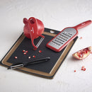 Victorinox Swiss Made Stainless Steel Swiss Classic Serrated/Wavy Edge Universal Peeler, Black, Fruit & Vegetable Peeler