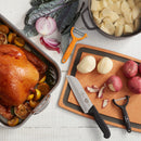 Victorinox Swiss Made, Stainless Steel Multipurpose Peeler, Serrated/Wavy Double Edge, Orange, Peel Tomato Kiwi