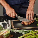 Victorinox Grand Maitre Stainless Steel Forged Santoku Knife, Fluted Edge, 17 cm, Black, Swiss made